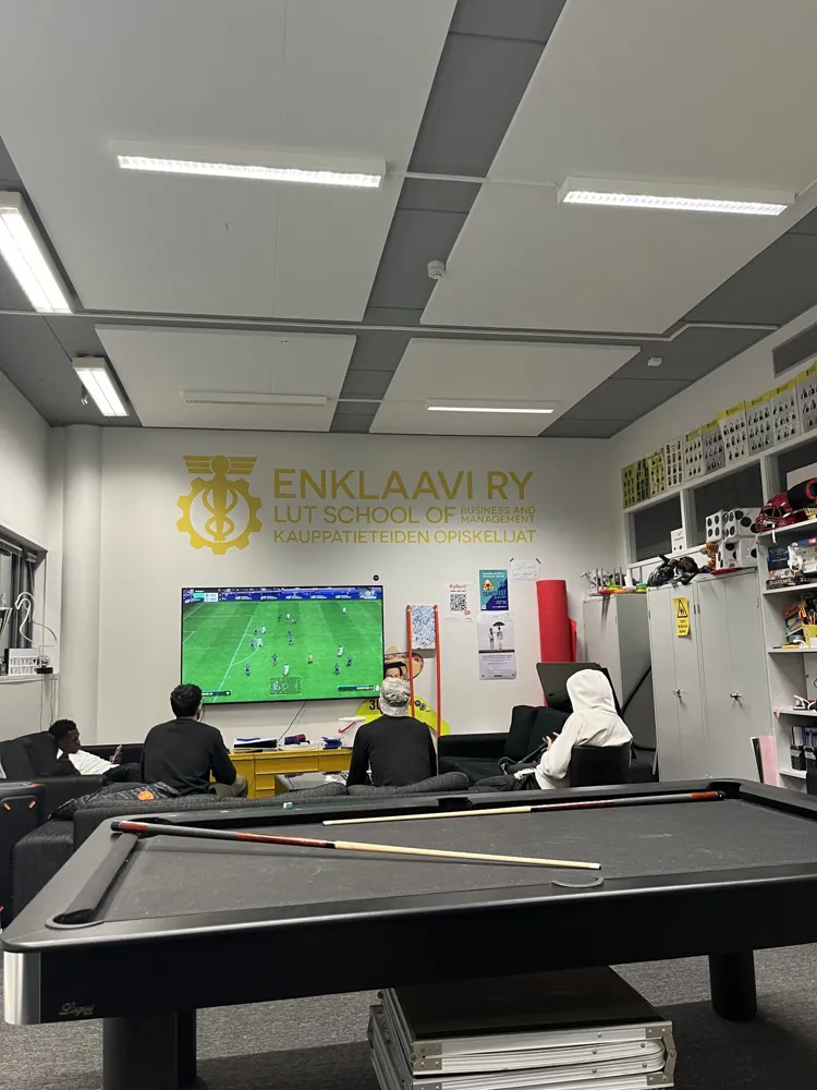 The guild room’s billiard table and TV