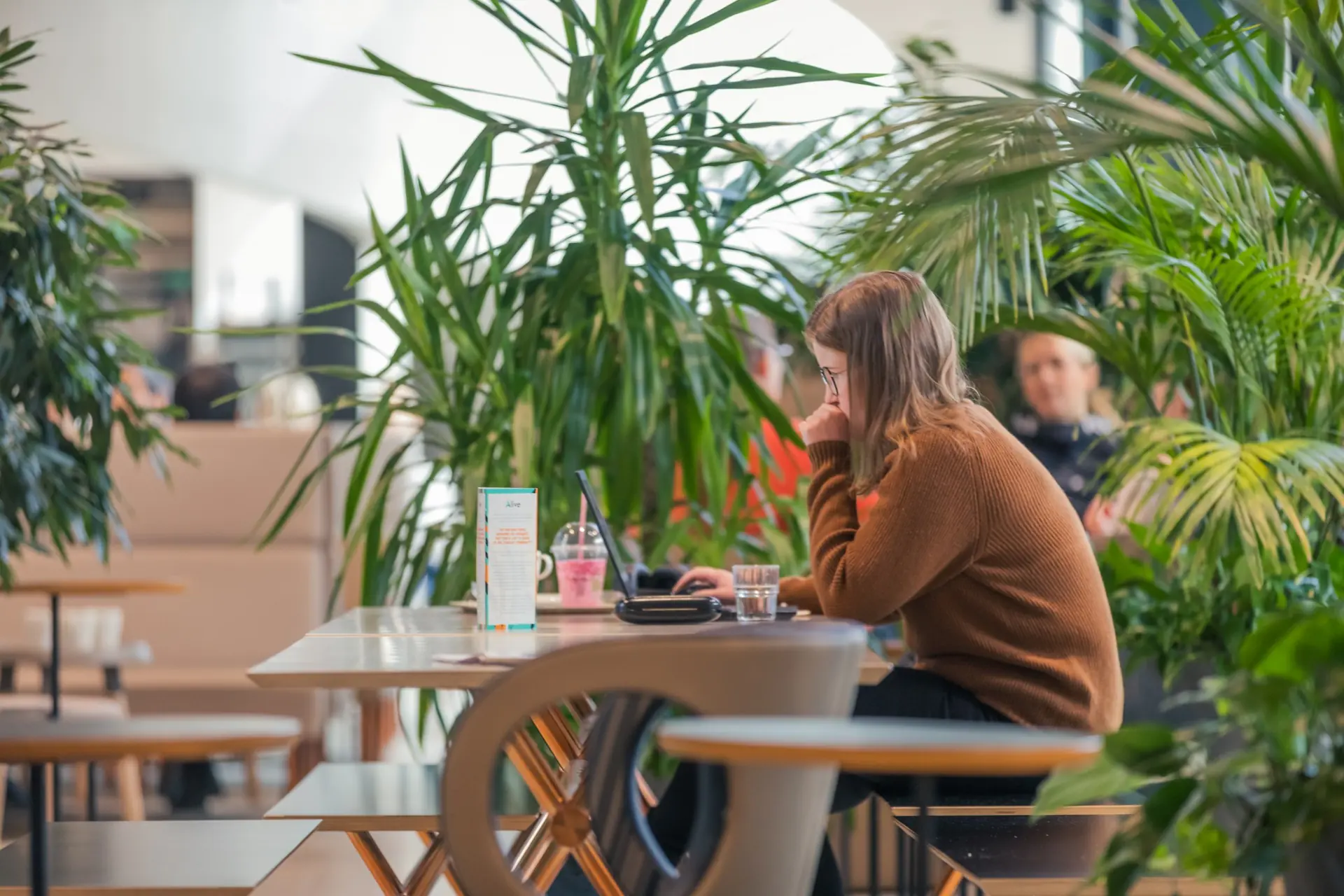 A student working in the campus café