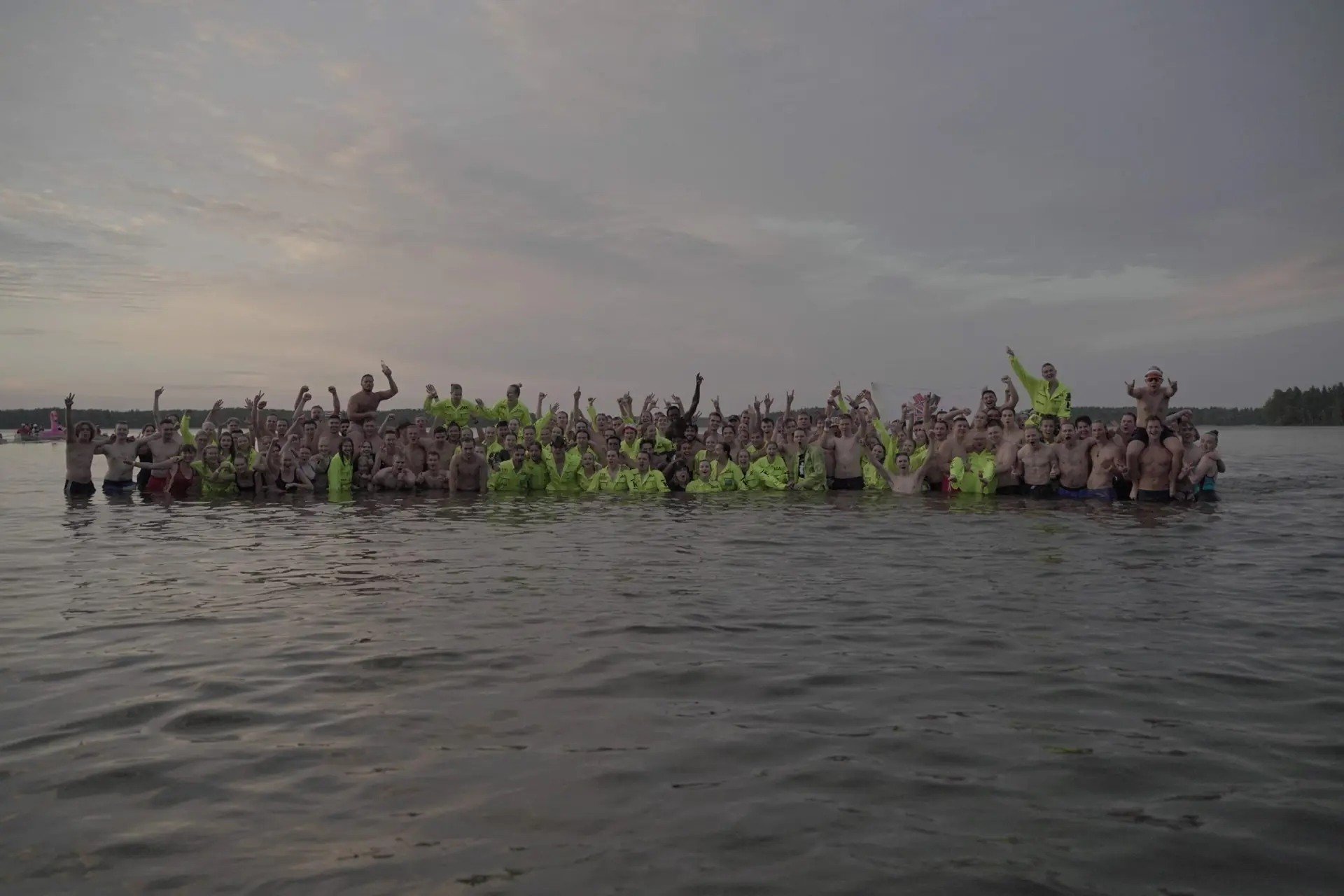 Students in Lake Saimaa at dusk